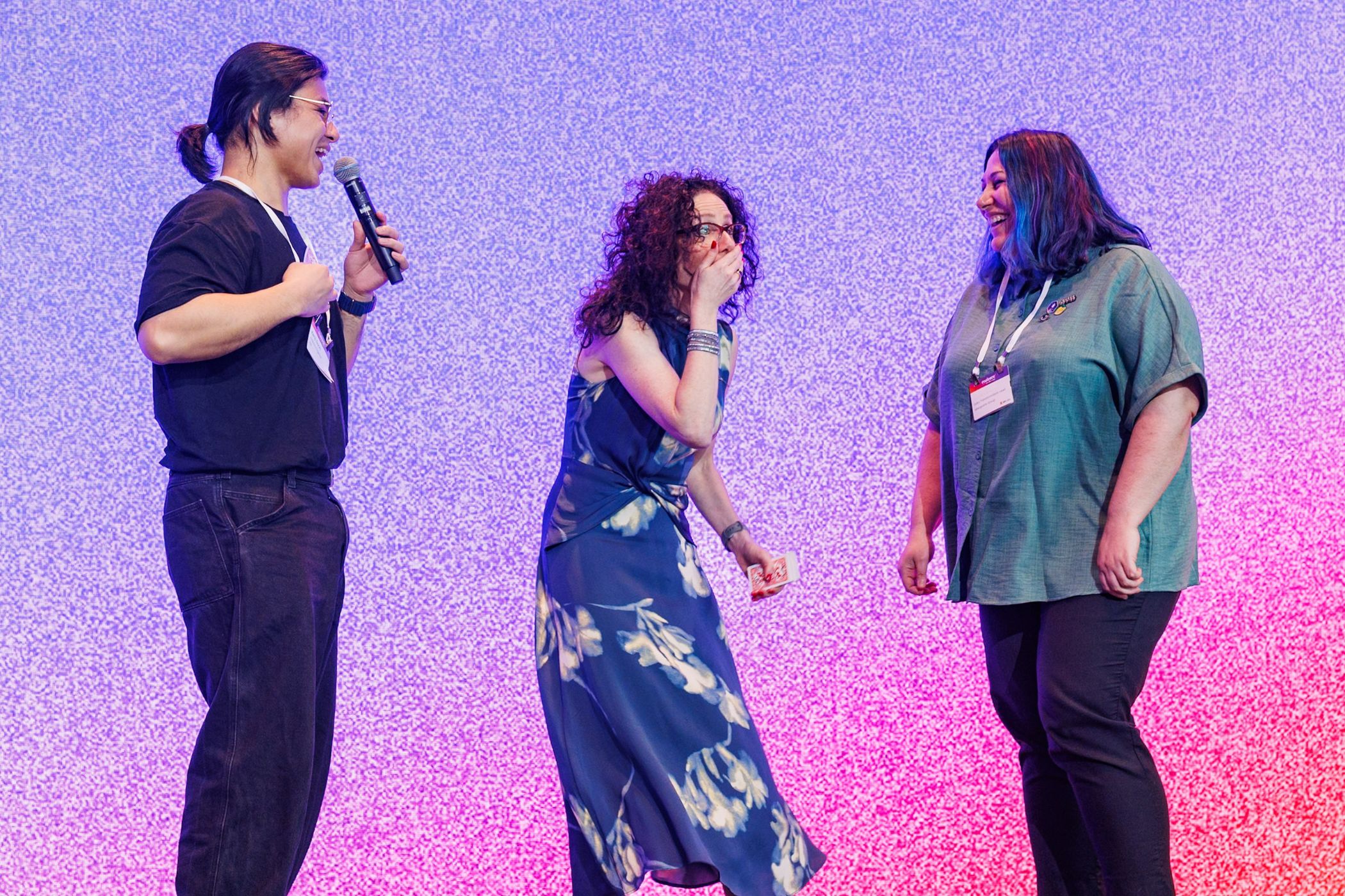 Guests laughing on stage with Jordana Borensztajn